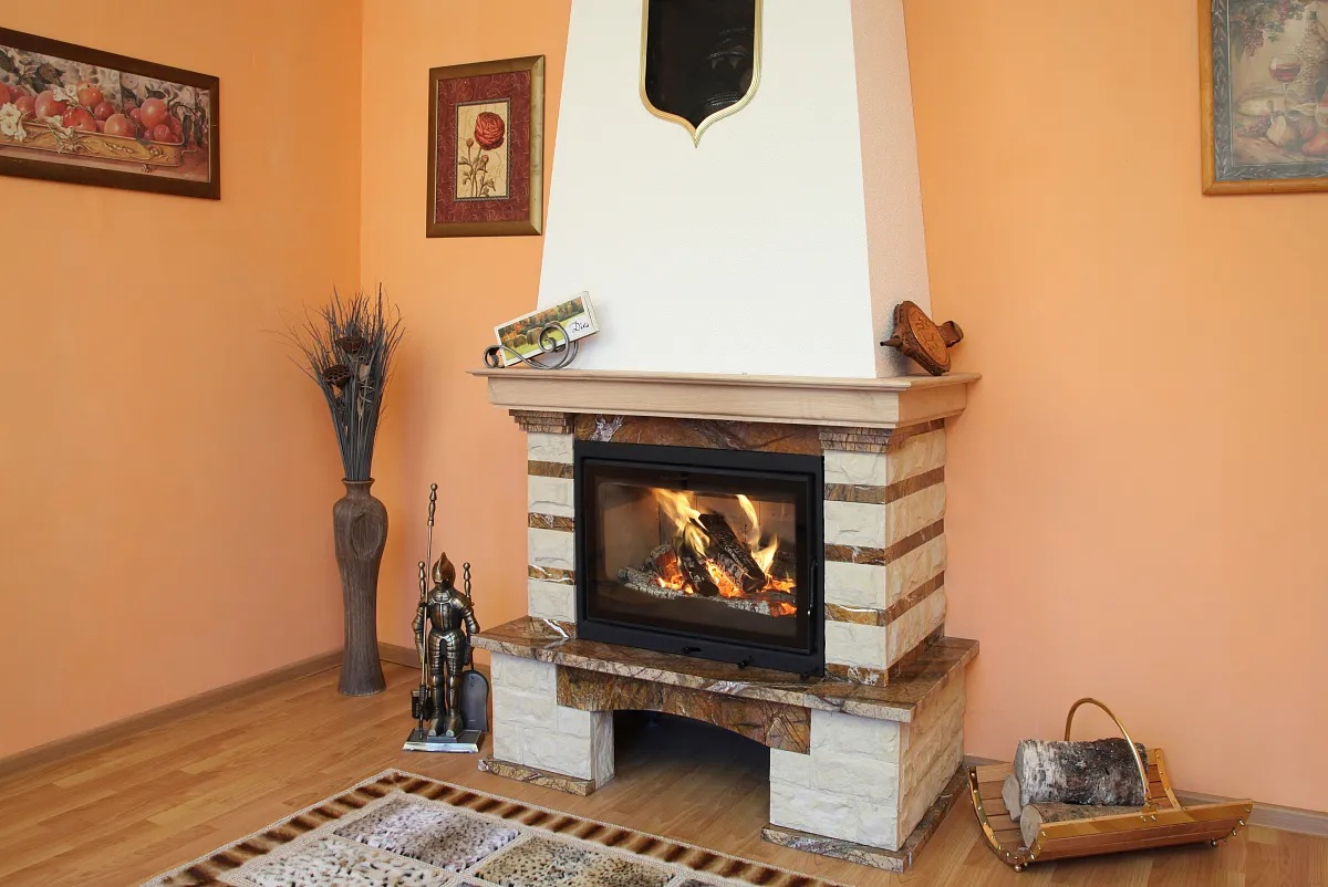 Фото Можно ли установить каминную топку в уже существующий камин?